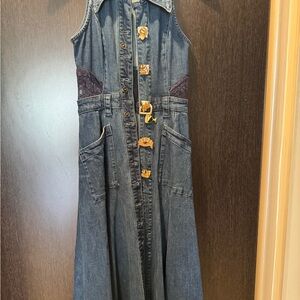 Denim maxi dress with lace detailing on the back . Never been worn.